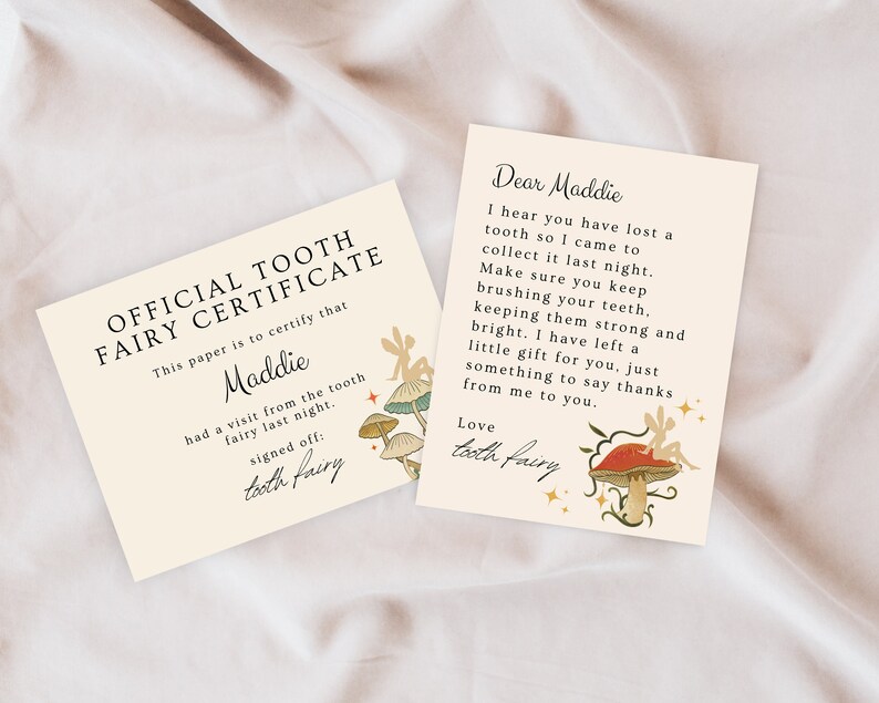 May include: A tooth fairy certificate with a whimsical illustration of fairies and mushrooms. The certificate reads "Official Tooth Fairy Certificate" and is addressed to Maddie. The text says "This paper is to certify that Maddie had a visit from the tooth fairy last night. Signed off: tooth fairy."