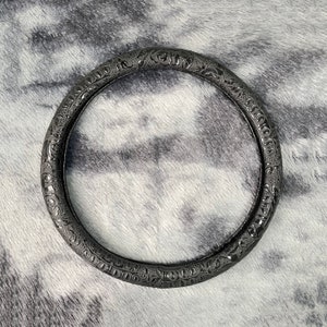 Tooled leather steering wheel cover - .de