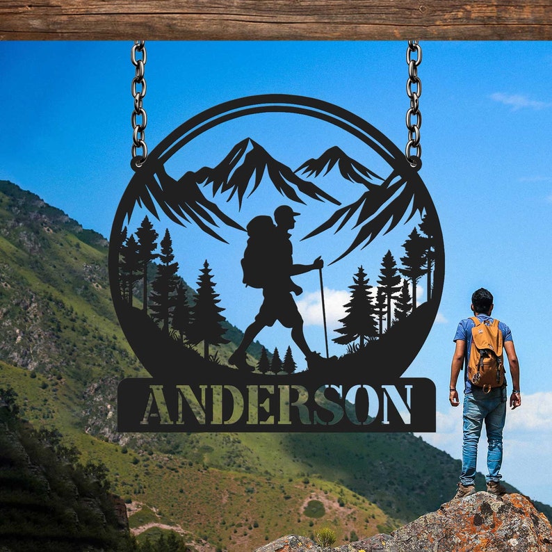 May include: Black metal sign with a hiker silhouette in a mountain landscape. The sign reads "ANDERSON" in a decorative font.