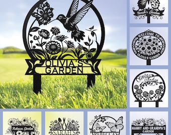 May include: A set of 10 metal garden stakes with different designs. Each stake features a circular design with a floral motif and a personalized name. The designs include a hummingbird, butterflies, sunflowers, and roses. The stakes are black and are perfect for adding a touch of personalization to any garden.