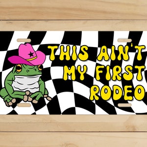 Front License Plate, Funny Country Frog Truck Tag, Cute Purple Hat Stoic Frog, Funky Western Frog Gift, Ain't My First Rodeo, Country Toad