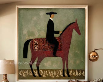 May include: A framed artwork depicts a figure in black attire on a red horse, set against a muted green backdrop. The horse has a patterned saddle blanket. The artwork is displayed above a wooden daybed with decorative pillows.