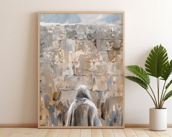 May include: A framed painting of a city scene with a person in a hooded cloak walking towards the viewer. The city is painted in shades of brown, gray, and white, and the sky is a light blue. The painting is framed in a light wood frame.