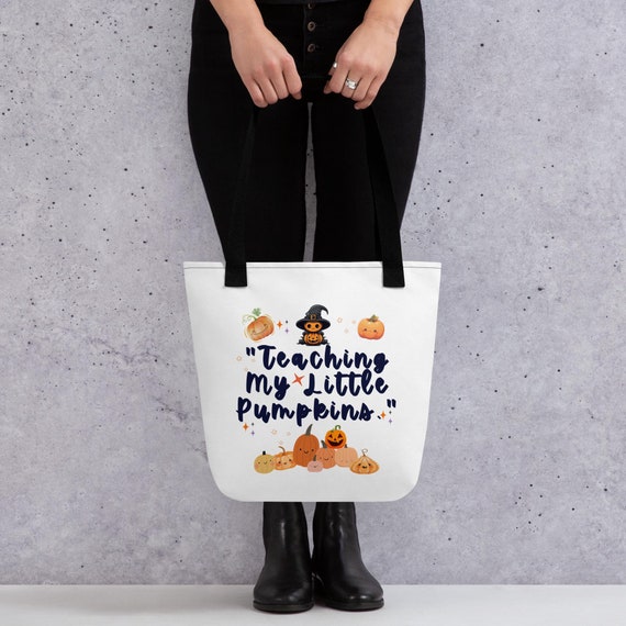 Teacher spacious and trendy tote bag to help you carry around everything that matters.