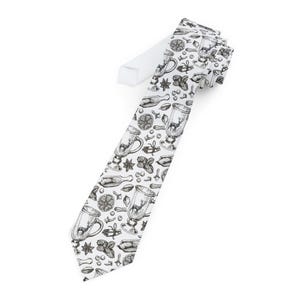May include: White tie featuring a black and white pattern of a deer in a glass, spices, and citrus slices. The tie is made of a smooth fabric and is suitable for formal or casual wear. The design is a repeating pattern.