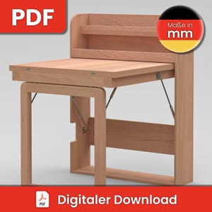Op de afbeelding: Een licht houten opklapbare wandtafel met een plank en een metalen steunsysteem. De tafel is gesloten en tegen de muur geklapt. De tekst "Maße in mm" is zichtbaar in de rechterbovenhoek van de afbeelding.
