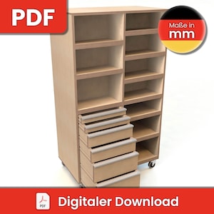 May include: A wooden cabinet with shelves and drawers on wheels. The cabinet has a light wood finish and is designed for storage. The text "Maße in mm" is visible on the cabinet.