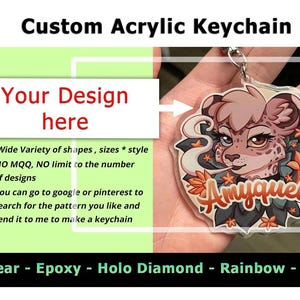 May include: A custom acrylic keychain featuring a colourful illustration of a spotted feline character with the name Amyquel written below. The keychain includes a metal ring and is displayed alongside text detailing custom design options.