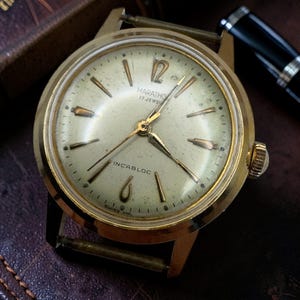 BELLE MONTRE ANCIENNE mécanique homme EDMA pl OR date FE 140.1A