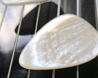 Mesmerizing Freshwater Mother of Pearl Guitar Picks - Natural White and Honey-Cream Iridescence