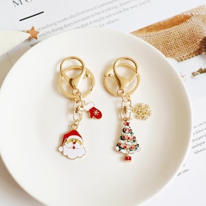 Presente de Ano Novo Papai Noel chaveiro luvas de árvore de Natal saco de floco de neve charme casal chaveiro saco com acessórios Airpods case acessórios
