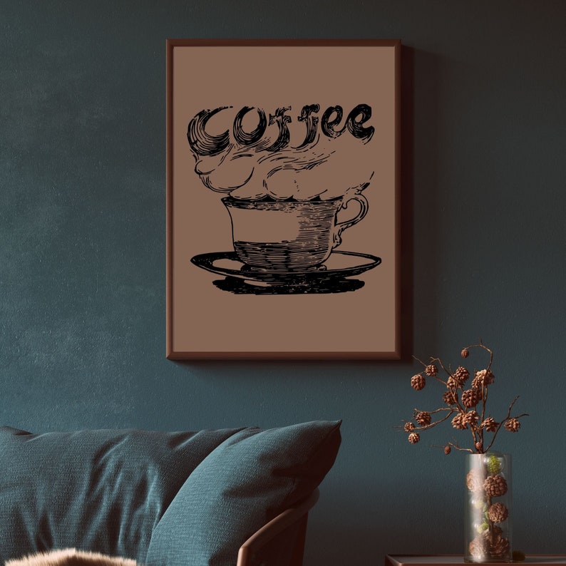 May include: A framed print of a black and white illustration of a coffee cup with steam rising above it. The steam is shaped like the word "coffee".