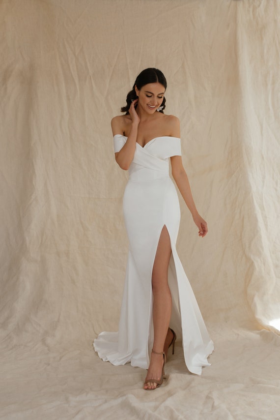 Satin Wedding Dress. SAMPLE SALE Off the Shoulder Bride Gown with High Slit, Simple Fit and Flare Corset Wedding Dress Chloe Satin Wedding Dress. SAMPLE SALE Off the Shoulder Bride Gown with High Slit, Simple Fit and Flare Corset Wedding Dress Chloe