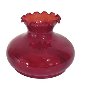 May include: A deep red glass lamp shade with a bulbous, rounded body and a narrow, ruffled, scalloped opening at the top. The glass is translucent and smooth, featuring a consistent crimson hue throughout the entire structure of the lamp shade.