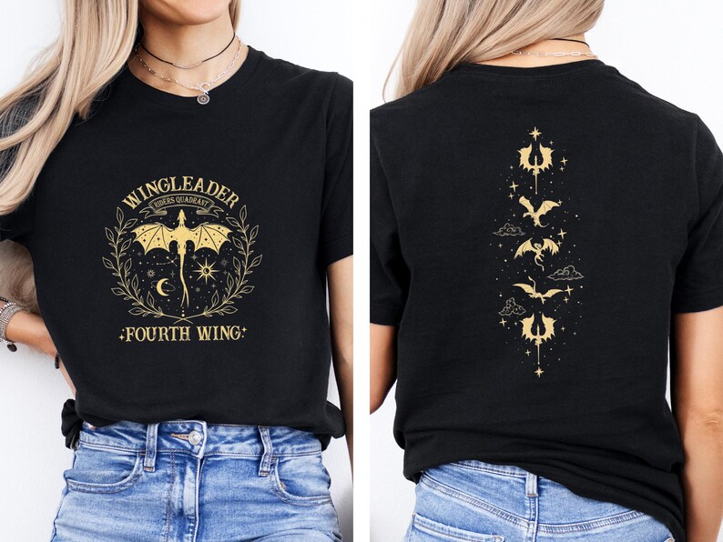 May include: Black t-shirt with a gold graphic of a dragon and the text "WINGLEADER FOURS GUARDIAN -FOURTH WING-". The back of the shirt has a vertical row of gold dragon silhouettes.