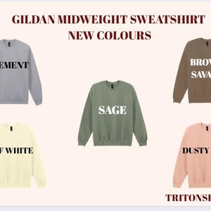 a collection of five midweight sweatshirts in various colors, including gray, green, brown, off white, and dusty rose.