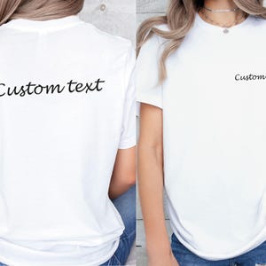 May include: White t-shirt with the text "Custom text" printed on the back and front.