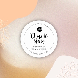 May include: A white circle with black text on a pink and peach background. The text says "YOUR BRAND NAME", "YOUR LOGO", "Thank You", "FOR YOUR ORDER", "AND FOR SUPPORTING", "MY SMALL BUSINESS!" and "YOURWEBSITE.COM".