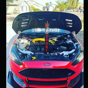 Custom metal hood prop