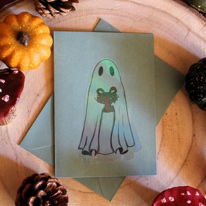 Carte double holographique fantôme tenant un cadeau Reproduction fait main pour Halloween illustration mignonne en relief Décoration automne