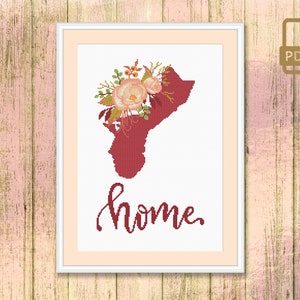 May include: Cross stitch pattern featuring a floral design with pink flowers and green leaves, a red outline of the state of Missouri, and the word "home" in cursive.
