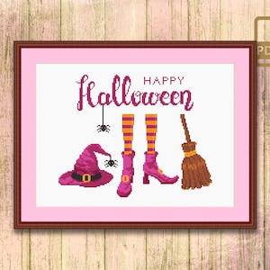 May include: A cross-stitch pattern featuring a witch's hat, boots, and broom with the text "Happy Halloween".