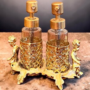 Sam Fink Hollywood Regency Gilded Gold Cherubs Vanity Perfume Atomizer Set