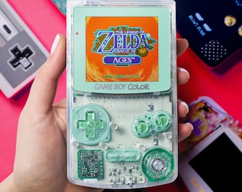 Dusty Green Game Boy Color – Clear Shell, Chrome Green Buttons, Dusty Green Lens | Modded GBC with Rechargeable Battery & LED Light Upgrade