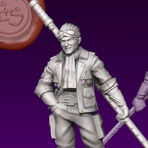 May include: A gray 3D printed miniature of a person wearing a jacket, goggles, and a scarf, holding a long staff. The miniature is standing on a black base. The background is purple.