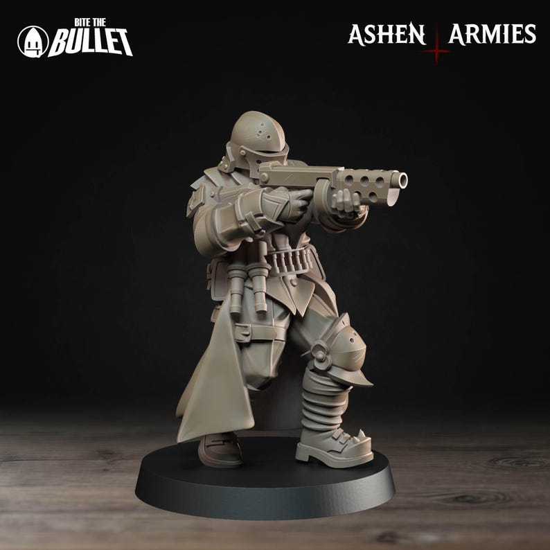 Op de afbeelding: Een grijze miniatuurfiguur van een soldaat in futuristisch pantser, met een geweer. De figuur staat op een zwarte basis. De woorden "Bite the Bullet" en "Ashen Armies" zijn zichtbaar.