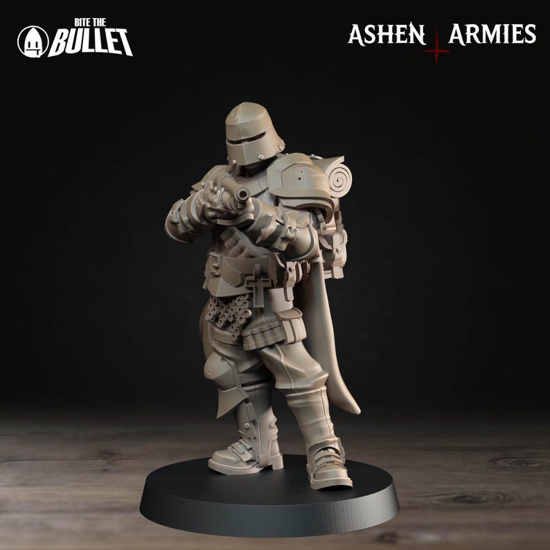 Op de afbeelding: Grijze miniatuurfiguur van een soldaat in volledige bepantsering, met een geweer. De figuur heeft een helm, schouderbeschermers en een cape. De basis is zwart en de figuur staat erop. De teksten "Bite the Bullet" en "Ashen Armies" zijn zichtbaar.