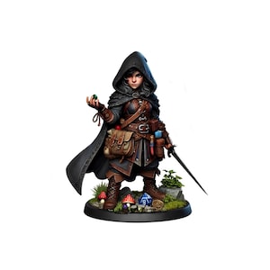 Könnte beinhalten: Eine Miniaturfigur einer weiblichen Figur, die einen schwarzen Kapuzenumhang, braune Lederstiefel und einen braunen Ledergürtel mit einer Tasche trägt. Sie hält eine grüne Kugel in ihrer rechten Hand und ein Schwert in ihrer linken Hand. Sie steht auf einem runden Sockel mit grünem Laub und Würfeln.
