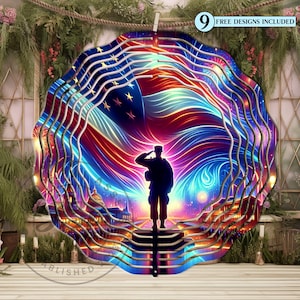 May include: A metal wind spinner with a patriotic design featuring an American flag, fireworks, and a silhouette of a soldier saluting. The design is in shades of red, white, blue, and gold.
