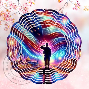 May include: A metal wind spinner with a patriotic design. The spinner features a silhouette of a soldier saluting in front of an American flag with fireworks in the background. The design is in shades of red, white, and blue.
