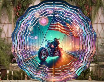 May include: A decorative wind spinner featuring a motorcycle rider on a bridge with an American flag. The artwork is vibrant with a colorful sky, fireworks, and the text "9 FREE DESIGNS INCLUDED". The spinner has a layered, wavy design with blue and purple hues.
