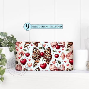 May include: A rectangular design featuring a repeating pattern of cherries, bows, and hearts on a light blue background. The bows have a leopard print design. The text "9 FREE DESIGNS INCLUDED" is in a blue rectangle.