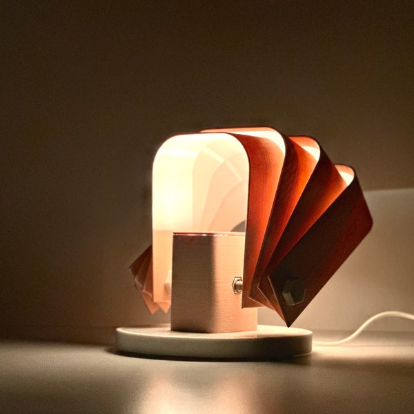 Lampe accordéon Sunset - Design articulé unique pour une lumière ambiante chaude