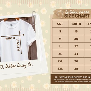 May include: A size chart for Gildan 64000 t-shirts, showing width and length measurements in inches for sizes S through 3XL. The chart includes a note that for an oversized look, size up 1-2x larger than your usual fit. It also suggests measuring your favorite t-shirt to determine the best size.