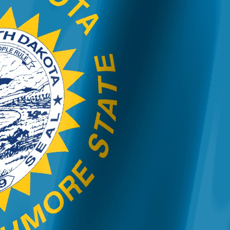 May include: The blue flag of South Dakota features a central yellow sunburst containing the state seal. The seal depicts a landscape with hills, a river, and a steamboat. Text reads SOUTH DAKOTA, THE MOUNT RUSHMORE STATE, and UNDER GOD THE PEOPLE RULE.