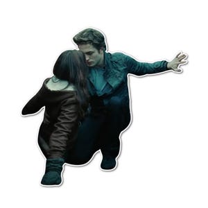 May include: A sticker featuring a scene from the movie Twilight. The image shows two people embracing, with one person kneeling. The person on the right is wearing a teal jacket and the person on the left is wearing a brown jacket.