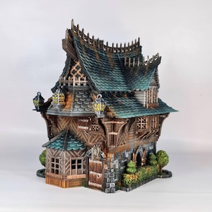 May include: A detailed miniature fantasy house with a multi-tiered roof, featuring a combination of wood, stone, and green roofing tiles. The house has multiple windows, decorative lanterns, and a small garden. The overall design is reminiscent of a medieval or fantasy setting.