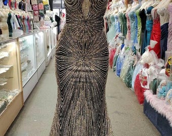 Strapless glitter fitted gown