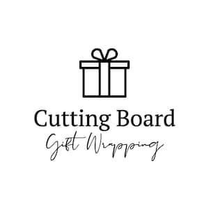 May include: Black and white line drawing of a gift box with a bow on top. The text "Cutting Board Gift Wrapping" is below the image.