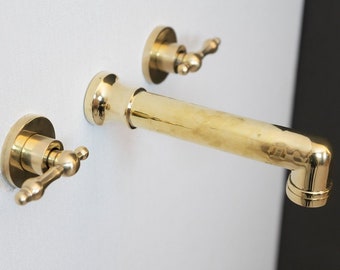 Unlacquered Brass Wall Mounted Faucet With Lever Handles