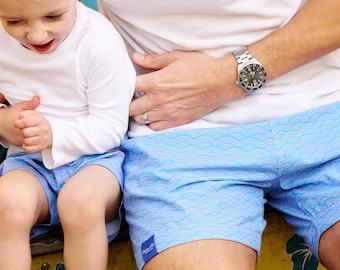 Captain and Cub Mens and Baby Boy Seaside Lined Matching Swimsuits