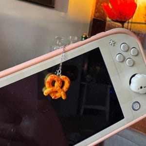 Pretzel | Nintendo Switch, Macbook, Playstation, Kindle Dust Plug Charm | Accessory for Cozy Gamers