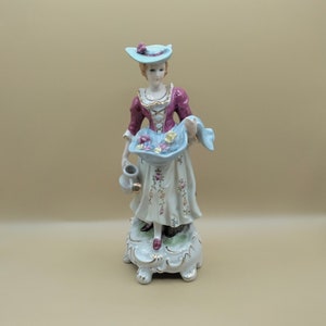 Japan woman figurine with a watering can and flowers ceramic china