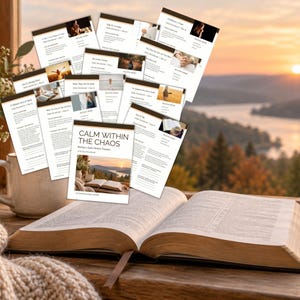 May include: A collection of printed devotional pages titled Calm Within The Chaos by Katherine Marie Shaffer, featuring a central booklet with a sunset landscape cover, displayed alongside an open book on a wooden surface with a ceramic mug.