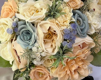 Dusty blue, cream, pale peach, Champaign round bridal bouquet for wedding