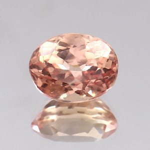 AAA Ceylon Padparadscha Sapphire: 3.60 Ct Oval Loose Gemstone